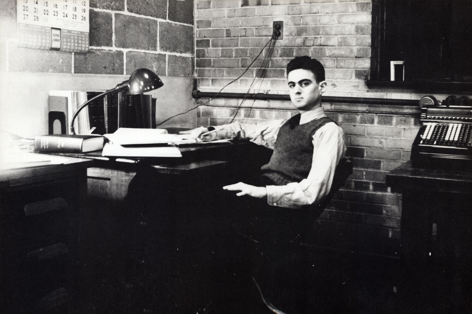 Chester P. Siess at desk